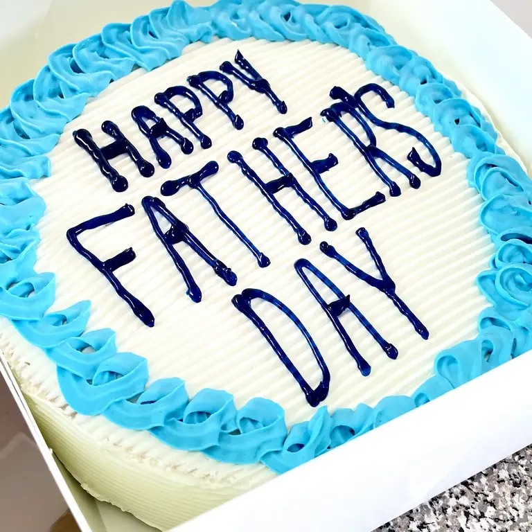 Father's Day ice cream cake with blue frosting border
