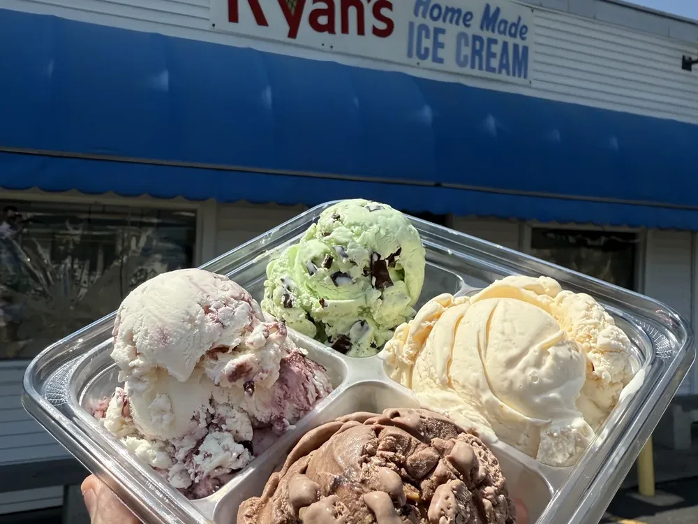 Flight sampler of four homemade ice cream flavors in front of Ryan's