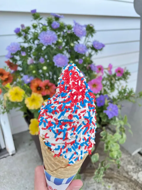 Soft serve cone with red white and blue sprinkles for the Fourth of July