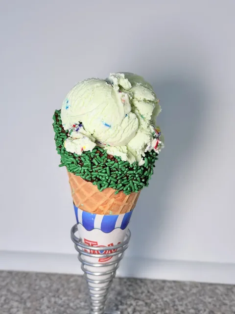 Mint ice cream cone with green sprinkles for St. Patrick's Day